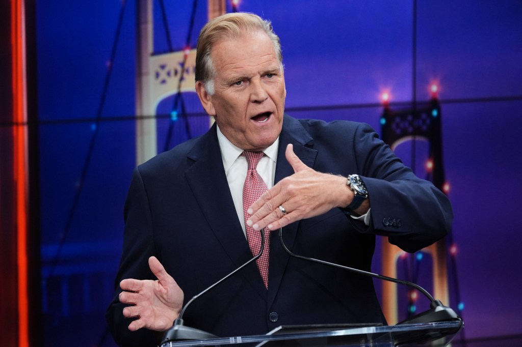 Republican nominee for U.S. Senate Mike Rogers makes a point during a televised debate with Democratic nominee for U.S. Senate Abdul El-Sayed at WOOD-TV, Thursday, Oct. 8, 2026, in Grand Rapids, Mich.