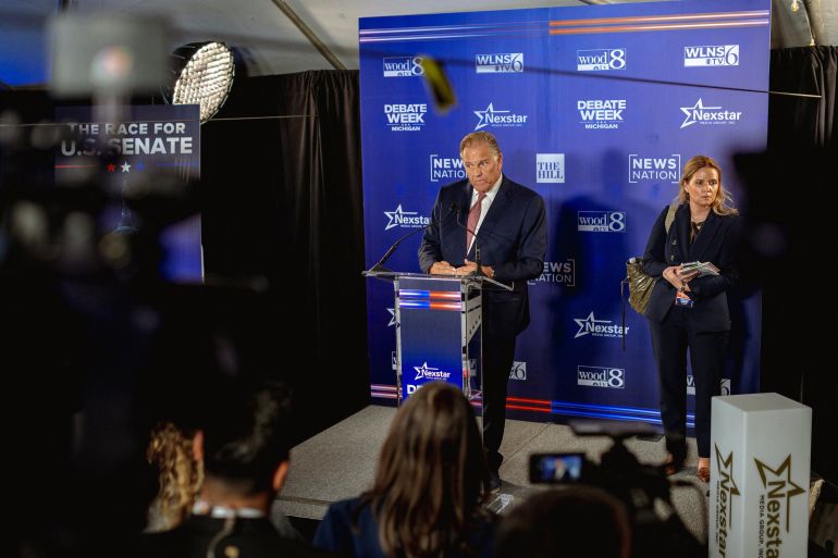 Republican US Senate candidate Mike Rogers looks on while speaking to the press in the spin room after taking part in a debate with Democratic rival candidate Abdul El-Sayed in Grand Rapids, Michigan, US, October 8, 2026. REUTERS/Jim Vondruska