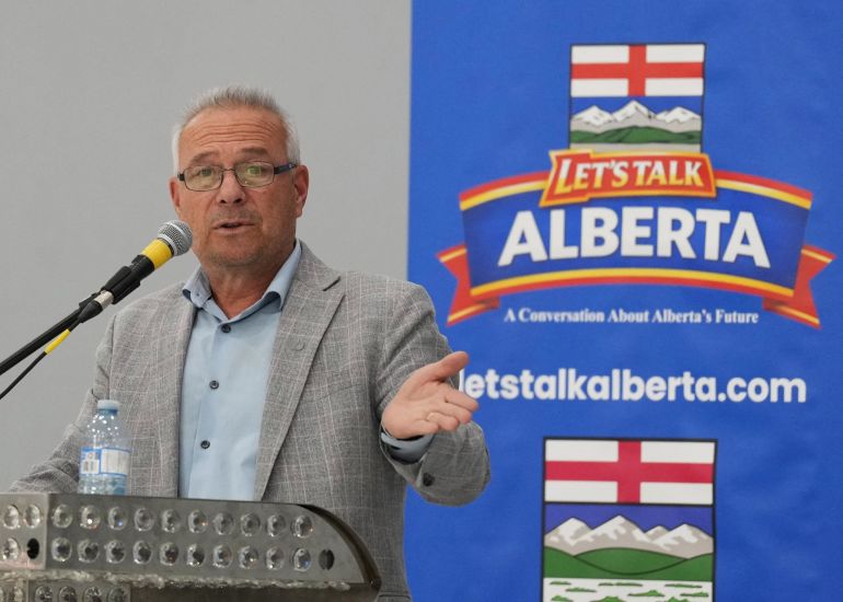 Separatist organizer Cory Morgan speaks to Alberta separatist supporters at a meeting by Let's Talk Alberta ahead of the October 19th Alberta referendum vote in Calgary, Alberta, Canada October 13, 2026. REUTERS/Todd Korol
