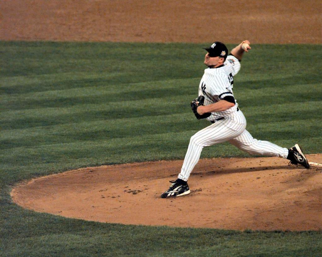 Roger Clemens pitching on the mound.
