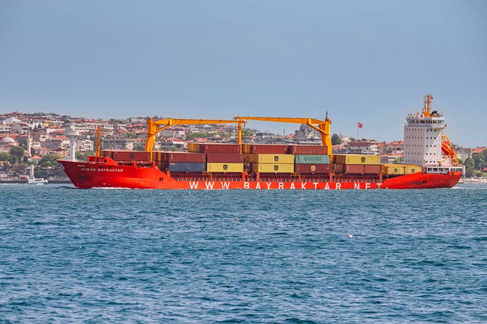 Istanbul, Turkey: A large cargo vessel at a bustling port along the Bosphorus, showcasing the busy maritime trade and logistics of shipping industry