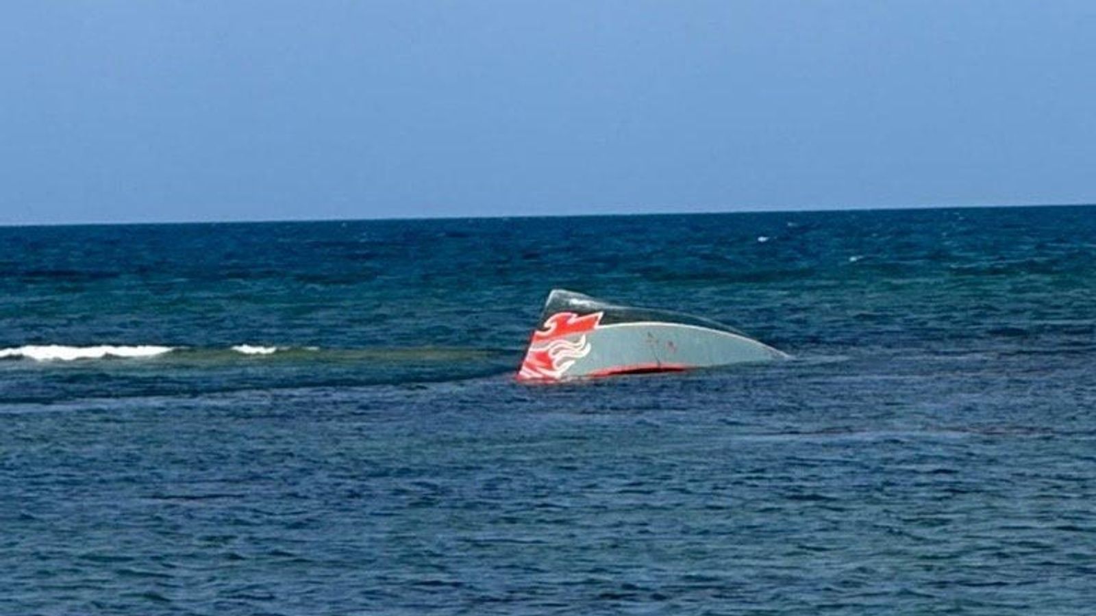 A part of the boat was seen in the water near Guhere in Djibouti. Pic: Reuters