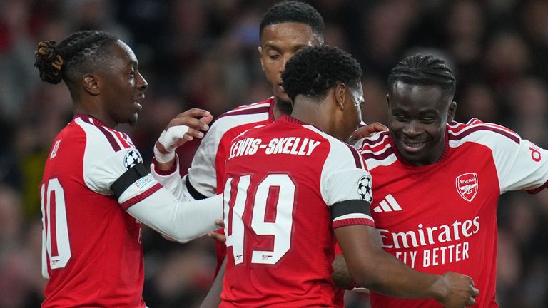Bukayo Saka celebrates with his Arsenal team-mates