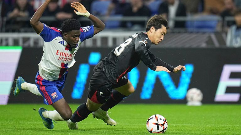 Daichi Kamada wanted a penalty after being brought down by Ernest Nuamah