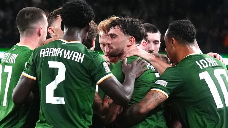 Parrott is congratulated after scoring his second goal against Austria