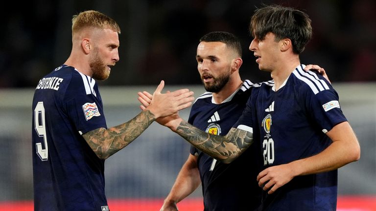 Scotland's Kieron Bowie celebrates with Oliver McBurnie and John McGinn after scoring the opener against North Macedonia