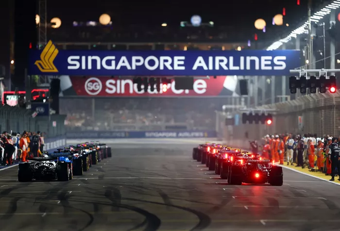 The drivers wait for the lights on