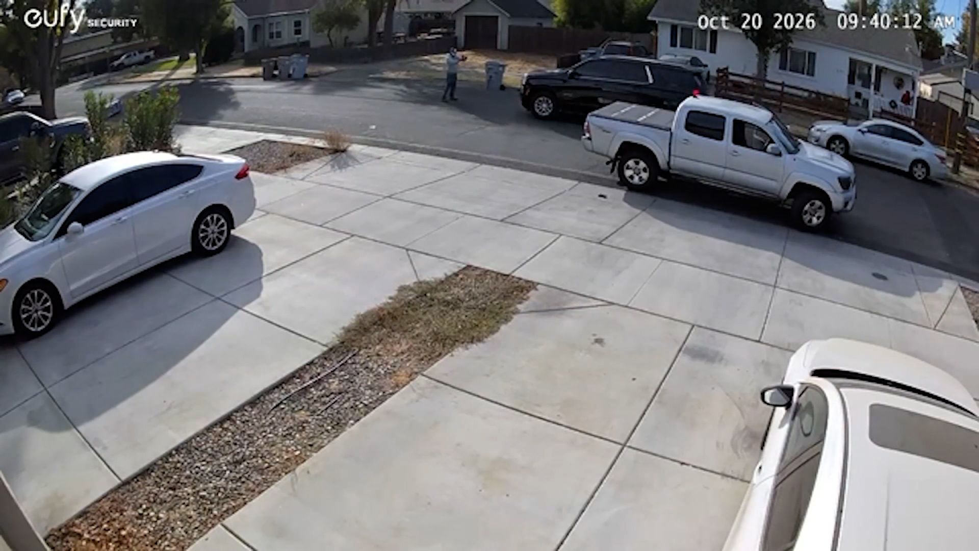 Surveillance footage from a Woodland, California, home shows an SUV driven by a federal immigration officer several feet from a protester before the vehicle struck him on the morning of October 20, 2026.