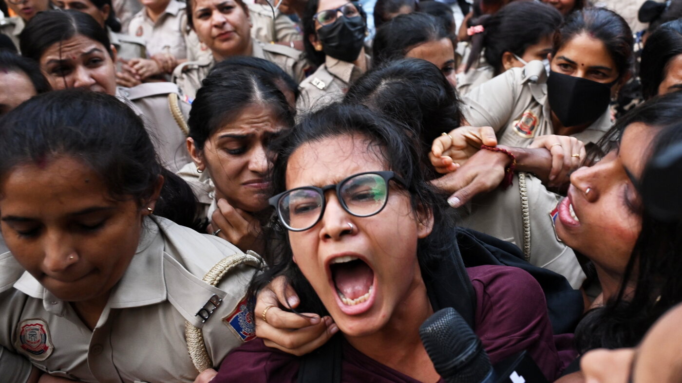 Crowds throng New Delhi and wave Indian flags amid escalating protests : NPR