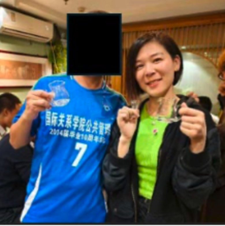 Another undated photo of Zhang used as evidence in the federal complaint made against her.
