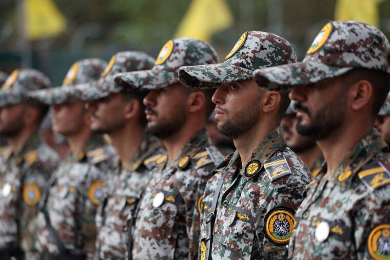 MAJID ASGARIPOUR/WANA (WEST ASIA NEWS AGENCY) VIA REUTERS / OCT. 3
                                Iranian army soldiers at a military training center for ordinary citizens at Haft-e Tir Square in central Tehran, Iran.